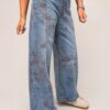 jeansy szwedy z haftem mokka czekolada designerskie jeansy damskie z haftem szerokie jeansy szwedy z przecieraniem jeansy damskie z haftem i szeroką nogawką przecierane jeansy premium damskie jeansy szwedy mokka czekolada spodnie jeansowe damskie z haftem modne szerokie jeansy z haftem