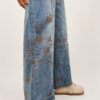 jeansy szwedy z haftem mokka czekolada designerskie jeansy damskie z haftem szerokie jeansy szwedy z przecieraniem jeansy damskie z haftem i szeroką nogawką przecierane jeansy premium damskie jeansy szwedy mokka czekolada spodnie jeansowe damskie z haftem modne szerokie jeansy z haftem