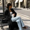 kardigan płaszcz NORAL BYME czarny długi czarny kardigan płaszcz BYME kardigan płaszcz NORAL śmietankowy ecru długi kardigan damski z kieszeniami elegancki kardigan płaszcz polski producent miękki kardigan płaszcz BYME kardigan płaszcz w stylu quiet luxury długi kardigan damski rozmiar uniwersalny