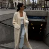 kardigan płaszcz NORAL BYME czarny długi czarny kardigan płaszcz BYME kardigan płaszcz NORAL śmietankowy ecru długi kardigan damski z kieszeniami elegancki kardigan płaszcz polski producent miękki kardigan płaszcz BYME kardigan płaszcz w stylu quiet luxury długi kardigan damski rozmiar uniwersalny