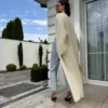 kardigan płaszcz NORAL BYME czarny długi czarny kardigan płaszcz BYME kardigan płaszcz NORAL śmietankowy ecru długi kardigan damski z kieszeniami elegancki kardigan płaszcz polski producent miękki kardigan płaszcz BYME kardigan płaszcz w stylu quiet luxury długi kardigan damski rozmiar uniwersalny